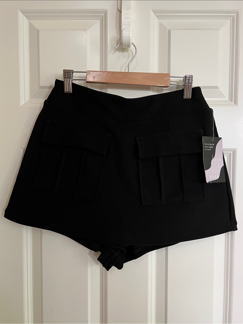 High-Rise Black Skort with Front Flap Pockets